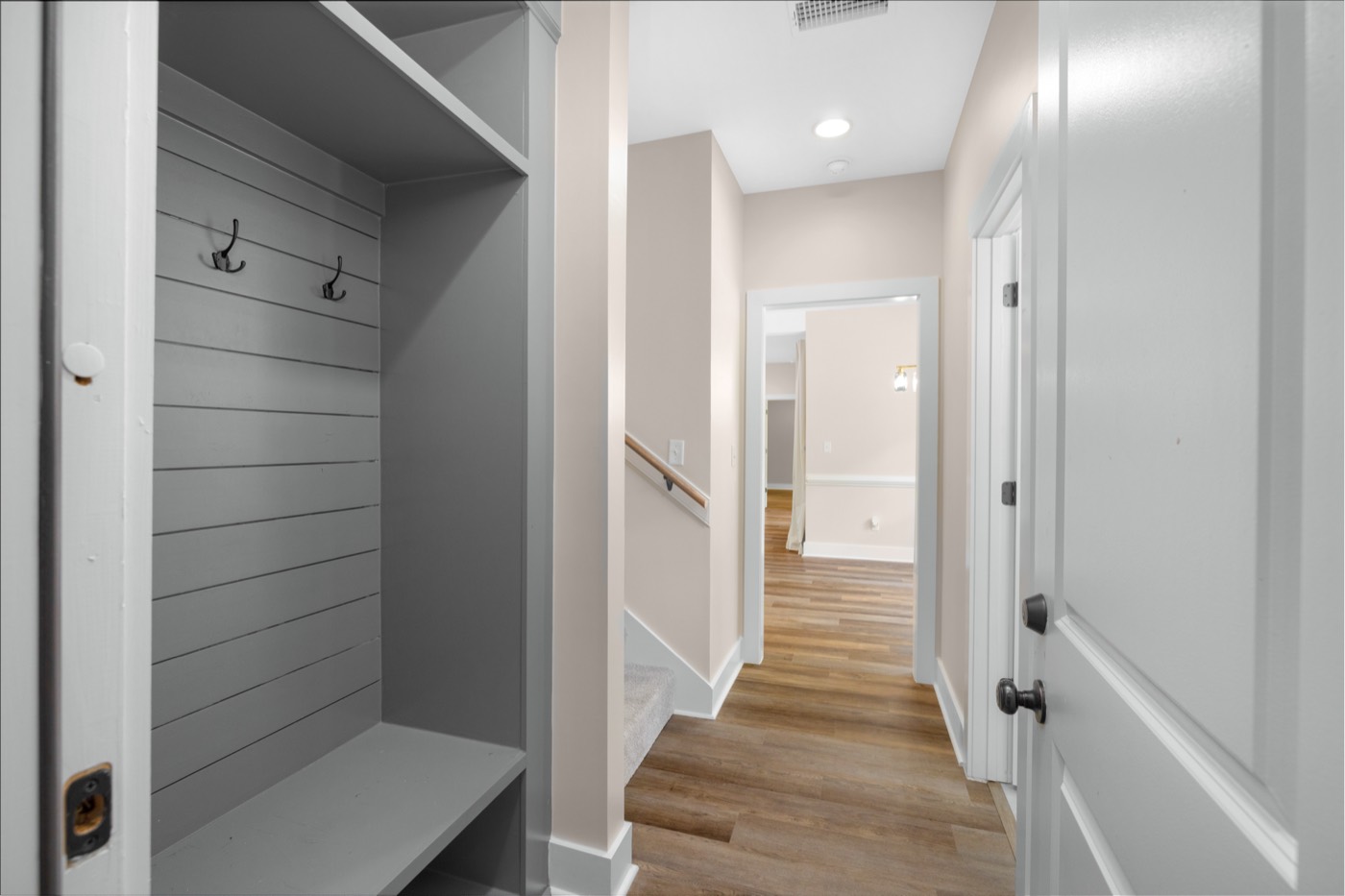 5702 E Spring Lake Rd: mudroom bench and hall